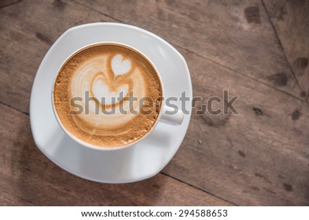 A cup of coffee, morning light with a cup of coffee on the table