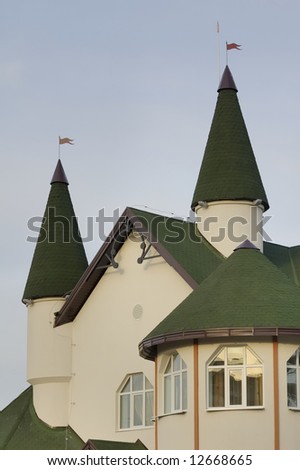 View on the top of house constructed in the style of Middle-Ages castle