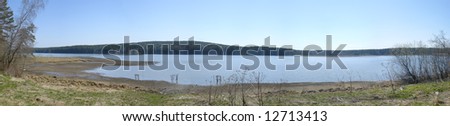 Panoramic photo of Revda river coast