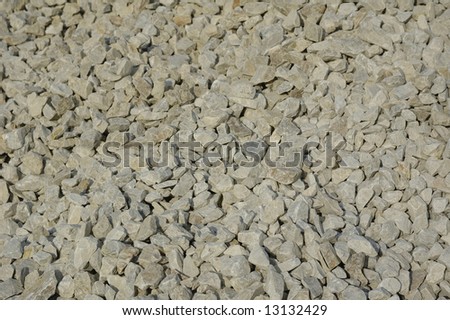 Crushed stone background. Gray granite
