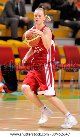 YEKATERINBURG, RUSSIA - OCT 28: Number 5, M.Sauliute (TEO) takes the ball during the Euroleague 2009 basket game against UMMC held on Oct 28, 2009 in Yekaterinburg, Russia. UMMC beat TEO, 85 to 56.