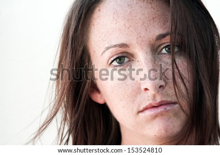 Close-up of freckled, natural beauty