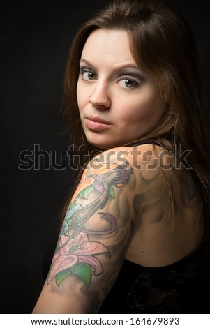 Beautiful Female model with tattoo