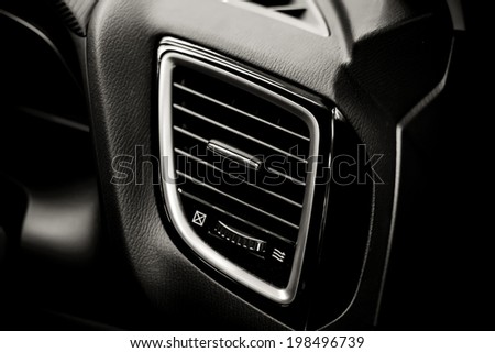 Details of air conditioning (car ventilation system) in modern car , black and white