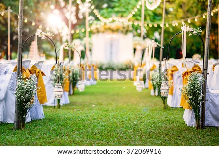 Beautiful  Wedding ceremony in garden at sunset