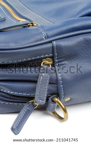 Details of Blue Leather Sporty Bag with Gold Zippers and Stitches isolated on white background