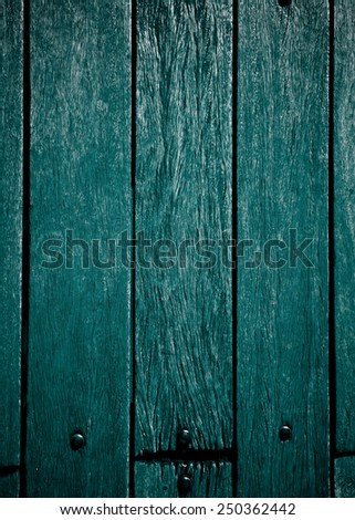 Background of Turquoise Old Wooden Deck Board with Nail Heads closeup