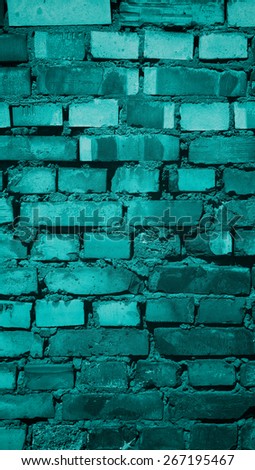 Background of Old Damaged Variegated Brick with Concrete Smoothing. Turquoise Toned