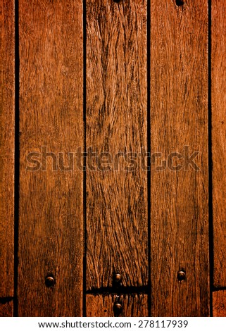 Background of Terracotta Old Wooden Deck Board with Nail Heads closeup