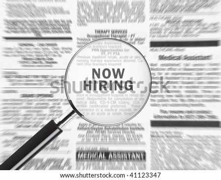 Now hiring ad through a magnifying glass