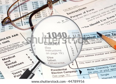 Federal tax forms under the magnifying glass