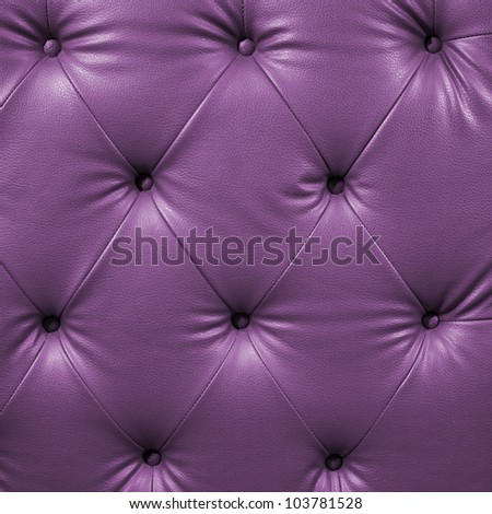 Close up violet luxury buttoned black leather