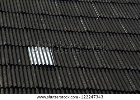 Black color roof of house
