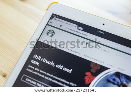 CHIANG MAI, THAILAND - SEPTEMBER 07, 2014: Photo of Starbucks Coffee Company homepage on a Apple iPad Air.