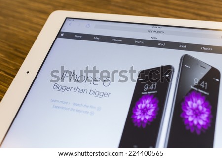 CHIANG MAI, THAILAND - September 17, 2014: Apple Computers website with the newly launched smart phones Apple iPhone 6 and iPhone 6 Plus seen on Apple iPad Air.