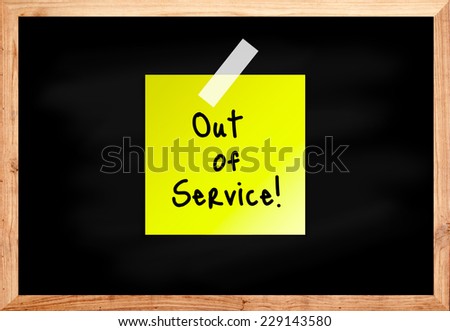 Out of service on wood blackboard in black color