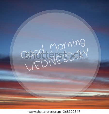 Good Morning Wednesday on sunrise sky blur background.