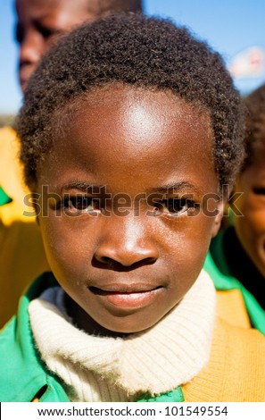 MALOLOTJA, SWAZILAND-JULY 31: Unidentified orphan schoolboy on July 31, 2008 in Malolotja Government School, Malolotja, Swaziland. Close to 10% of Swazilands population are orphans, due to HIV/AIDS.