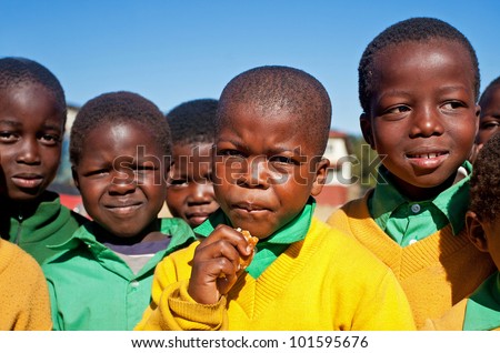 MALOLOTJA, SWAZILAND-JULY 31: Unidentified orphan schoolboys on July 31, 2008 in Malolotja Government School, Malolotja, Swaziland. Close to 10% of SwazilandÃ¢Â?Â?s population are orphans, due to HIV/AIDS.