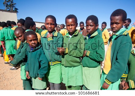 MALOLOTJA, SWAZILAND-JULY 31: Unidentified orphan pupil on July 31, 2008 in Malolotja Government School, Malolotja, Swaziland. Close to 10% of SwazilandÃ¢Â?Â?s population are orphans, due to HIV/AIDS.