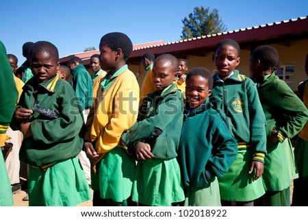 MALOLOTJA, SWAZILAND-JULY 31: Unidentified orphan schoolgirls on July 31, 2008 in Malolotja Government School, Malolotja, Swaziland. Close to 10% of SwazilandÃ¢Â?Â?s population are orphans, due to HIV/AIDS