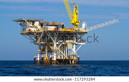 Large Pacific Ocean offshore oil rig drilling platform off the southern coast of California, between Ventura and the Channel Islands