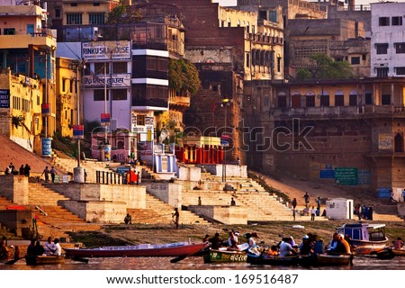 VARANASI, INDIA - APRIL 24: Boats on the river Ganga on April 24, 2011 in the city of Varanasi, India. Varanasi is one of the oldest continuously inhabited cities in the world and the oldest in India.