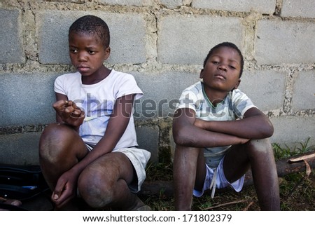 MBABANE, SWAZILAND- JULY 30: Portrait of unidentified Swazi girl and boy on July 30, 2008 in Mbabane, Swaziland. Close to 10 percent of SwazilandÃ¢Â?Â?s total population are orphans, due to HIV/AIDS.