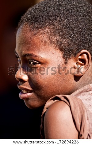 MBABANE, SWAZILAND - AUGUST 5: Portrait of unidentified orphan Swazi girl on August 5, 2008 in Mbabane, Swaziland. Close to 10 percent of Swaziland's total population are orphans, due to HIV/AIDS.