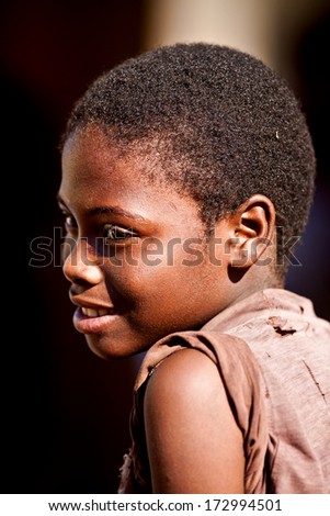 MBABANE, SWAZILAND - AUGUST 5: Portrait of unidentified orphan Swazi girl on August 5, 2008 in Mbabane, Swaziland. Close to 10 percent of Swaziland\'s total population are orphans, due to HIV/AIDS.