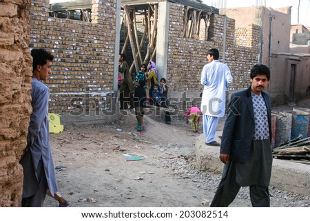 HERAT, AFGHANISTAN - OCT 28: Unidentified Afghan people on the street on October 28, 2012 in Herat, Afghanistan. Herat is the third largest city of Afghanistan, with a population of about 450,000.