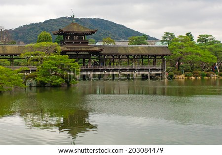 KYOTO, JAPAN - March 27, 2014: A bridge in the Zen Garden of the Heian-jingu Shrine on March 27, 2014. Heian-jingu Shrine is listed as an important cultural property of Japan.