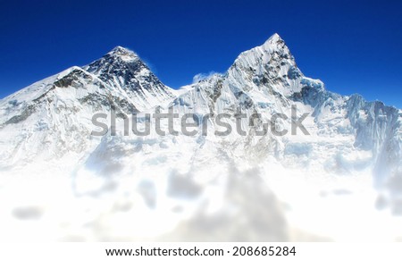World's highest mountain, Mt Everest (left, 8850m) and Mt. Nuptse (right) in the Himalayas, Nepal