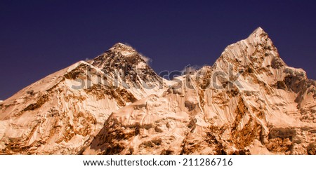 Sunrise at the world's highest mountain, Mt Everest (8850m) and Mt. Nuptse in the Himalayas, Nepal.