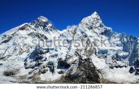 World\'s highest mountain, Mt Everest (left, 8850m) and Mt. Nuptse (right) in the Himalayas, Nepal