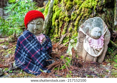 KOYASAN, JAPAN - MARCH 29: Okunoin Cemetery on March 29, 2014 at Mount Koya in Koyasan, Japan. Okunoin is one of the most sacred places in Japan and a popular pilgrimage spot.