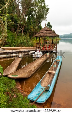 Traditional boats at Lake Bunyonyi in Uganda, Africa, at the borders of Uganda, Congo Democratic Republic and Rwanda, not far from the Bwindi National Park, home of the last mountain gorillas