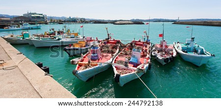 TANABE, JAPAN - MARCH 31: Fishing boats on March 31, 2014 in Tanabe, Japan. The fishing industry in Japan constitutes both a major industry and export. Japan has more than 2,000 fishing ports.