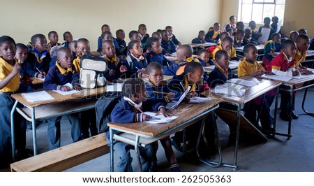 PIGGS PEAK, SWAZILAND-JULY 29: Unidentified students on July 29, 2008 in Nazarene Mission School, Piggs Peak, Swaziland. Close to 10% of Swazilands population are orphans, due to HIV/AIDS.