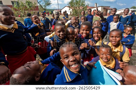 PIGGS PEAK, SWAZILAND-JULY 29: Unidentified Swazi schoolboys on July 29, 2008 in Nazarene Mission School, Piggs Peak, Swaziland. Close to 10% of the Swazi population are orphans, due to HIV/AIDS.