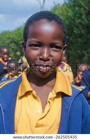 PIGGS PEAK, SWAZILAND-JULY 29: Unidentified Swazi schoolgirl on July 29, 2008 in Nazarene Mission School, Piggs Peak, Swaziland. Close to 10% of the Swazi population are orphans, due to HIV/AIDS.