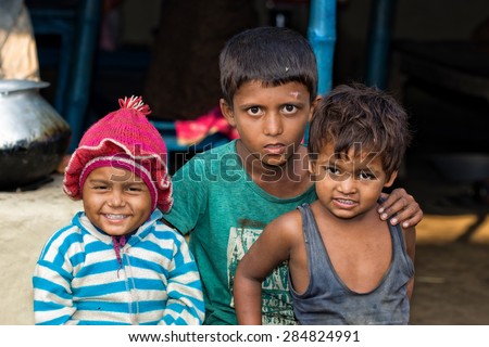 RAXAUL - NOV 7: Unidentified Indian children on Nov 7, 2013 in Raxaul, Bihar state, India. Bihar is one of the poorest states in India. The per capita income is about 300 dollars.