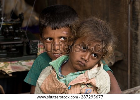 RAXAUL, INDIA - NOV 7: Unidentified Indian children on Nov 7, 2013 in Raxaul, Bihar state, India. Bihar is one of the poorest states in India. The per capita income is about 300 dollars.