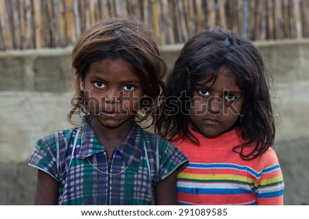 RAXAUL, INDIA - NOV 8: Unidentified Indian girls on Nov 8, 2013 in Raxaul, Bihar state, India. Bihar is one of the poorest states in India. The per capita income is about 300 dollars.