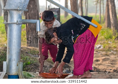 RAXAUL, INDIA - NOV 9: Unidentified Indian children on Nov 9, 2013 in Raxaul, Bihar state, India. Bihar is one of the poorest states in India. The per capita income is about 300 dollars.
