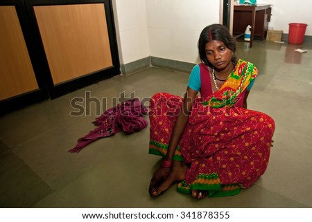 RAXAUL, INDIA - OCT 22: Unidentified Indian woman in a local hospital on Oct 22, 2011 in Raxaul, Bihar state, India. Bihar is one of the poorest states in India. The per capita income is 300 dollars.