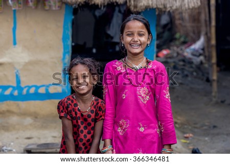 RAXAUL, INDIA - NOV 11: Unidentified Indian girls on Nov 11, 2013 in Raxaul, Bihar state, India. Bihar is one of the poorest states in India. The per capita income is about 300 dollars.