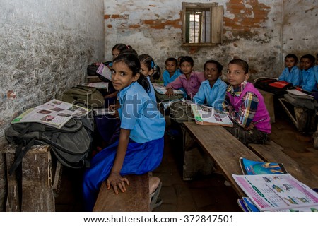 RAXAUL, INDIA - NOV 11: Unidentified Indian pupil in a local school on Nov 11, 2013 in Raxaul, Bihar, India. Bihar is one of the poorest states in India.
