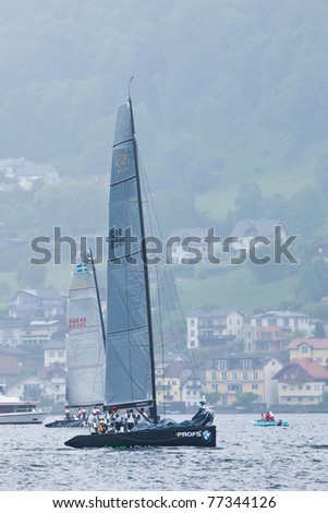 LAKE TRAUNSEE, AUSTRIA - MAY 15: TEAM AQUA team from Great Britain take the second place at the 2011 RC44 Austria Sailing Cup.RC44 on May 15, 2011 on Lake Traunsee, Austria.