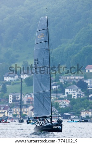 LAKE TRAUNSEE, AUSTRIA - MAY 15: TEAM AQUA team from Great Britain take the second place at the 2011 RC44 Austria Sailing Cup on May 15, 2011 on Lake Traunsee, Austria.